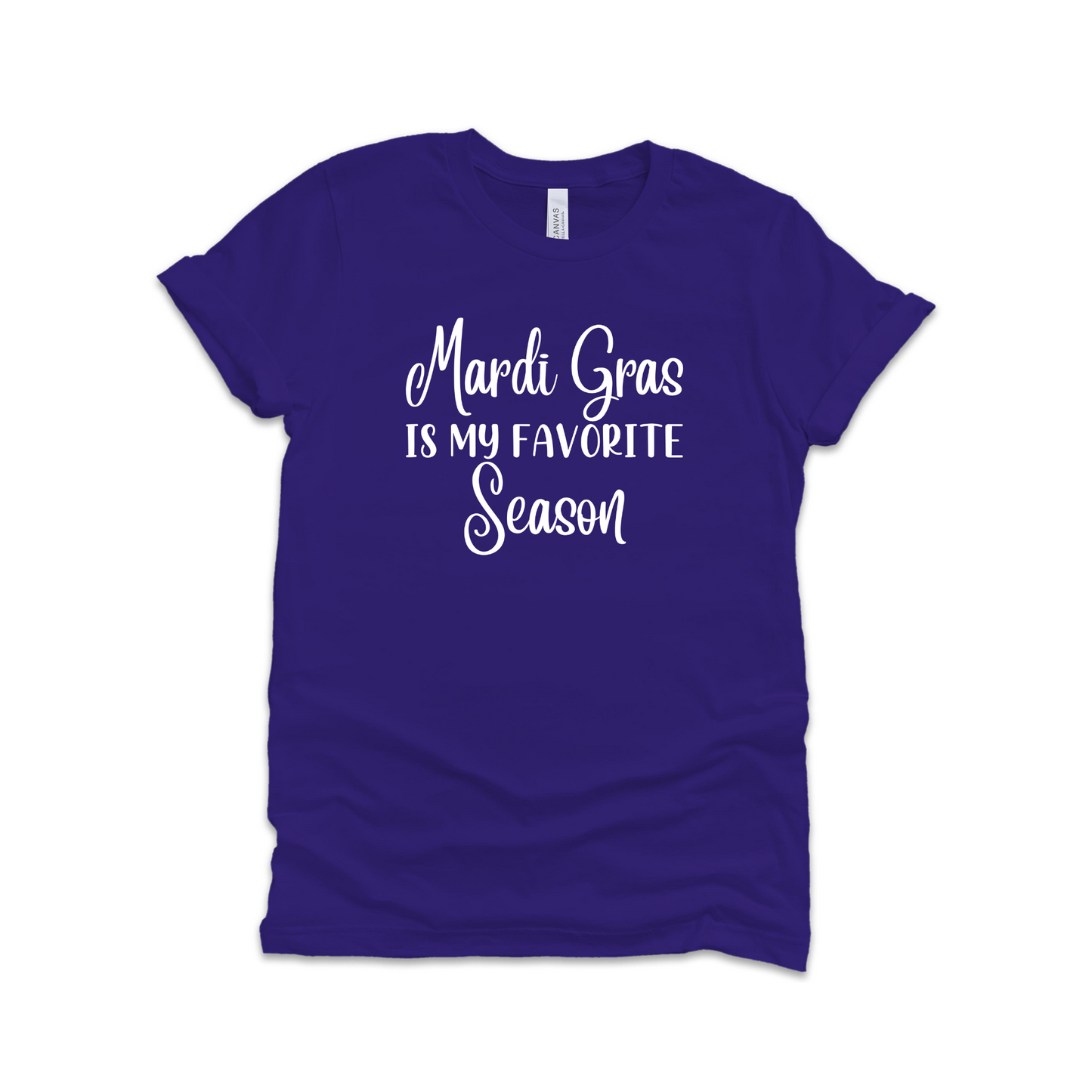 Purple t-shirt with white print that says Mardi Gras is my favorite season. Purple tshirt with white writing on white background.